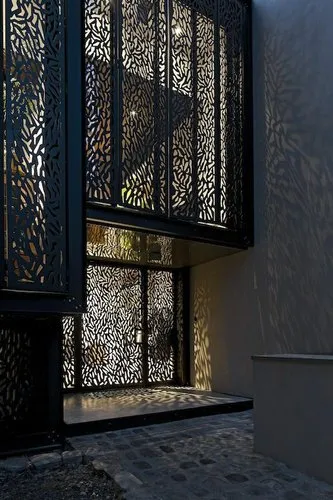 Hotel exterior with ornate laser-cut jali panels